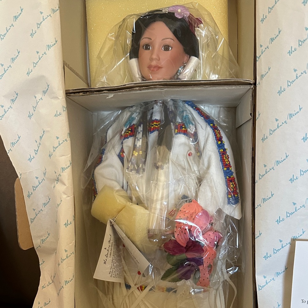 Danbury Mint Doll with White Dress and Colorful Accents